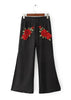 Calça Flare Bordada Floral Com Fenda Lateral