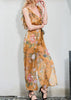 Macacão Chiffon Floral Decotado com Babado