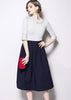 Conjunto Blusa e Saia Midi Gode com Cinto