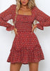Vestido Curto Manga Longa Estampado com Babado na Barra